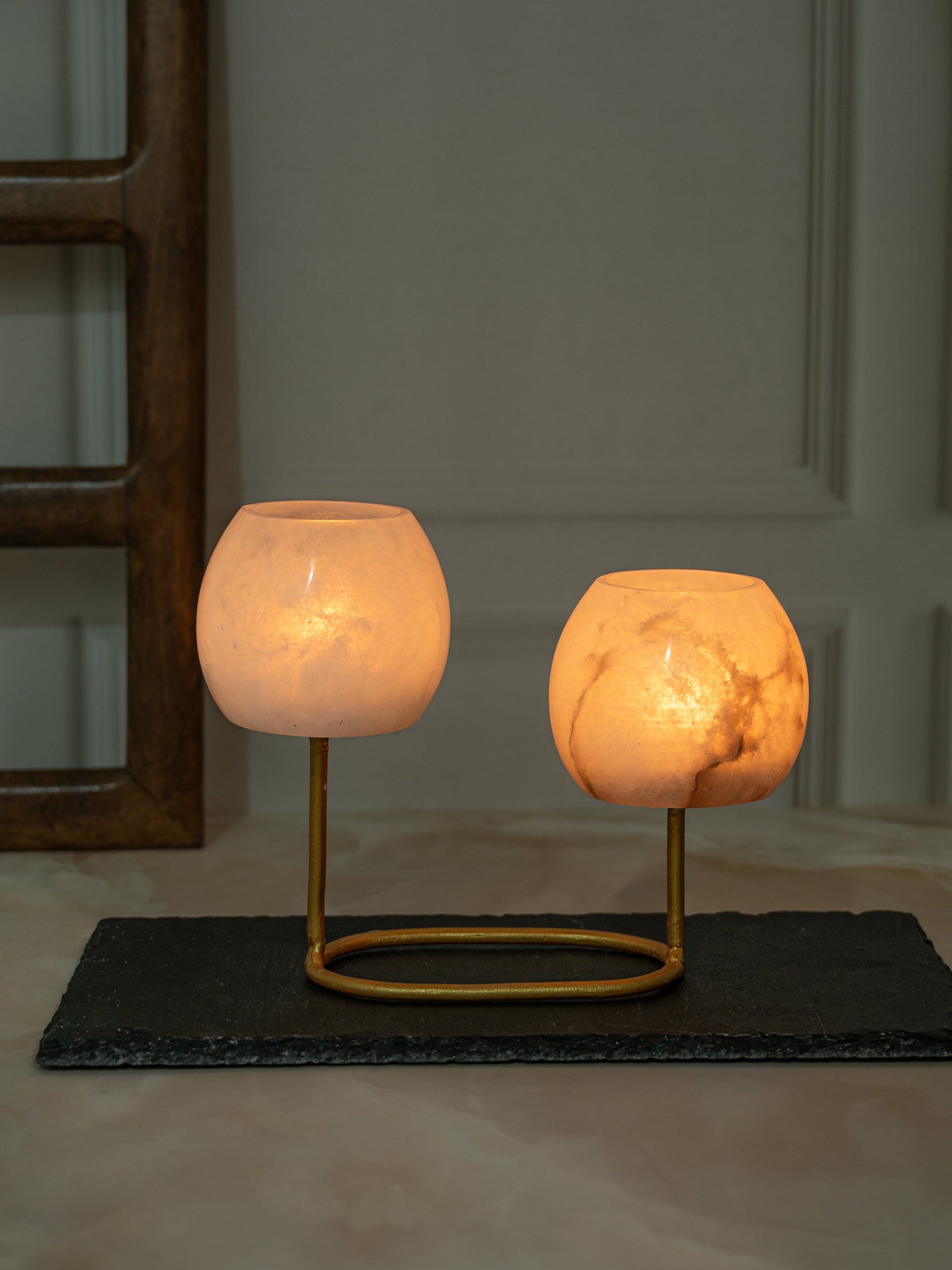 Stylish Pair of Candle Holder on a Beautiful Golden Frame