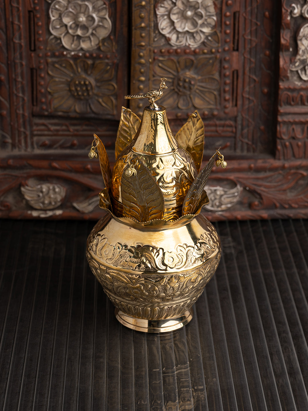 Brass crafted puja kalash with coconut and mango leaves - 10 inches