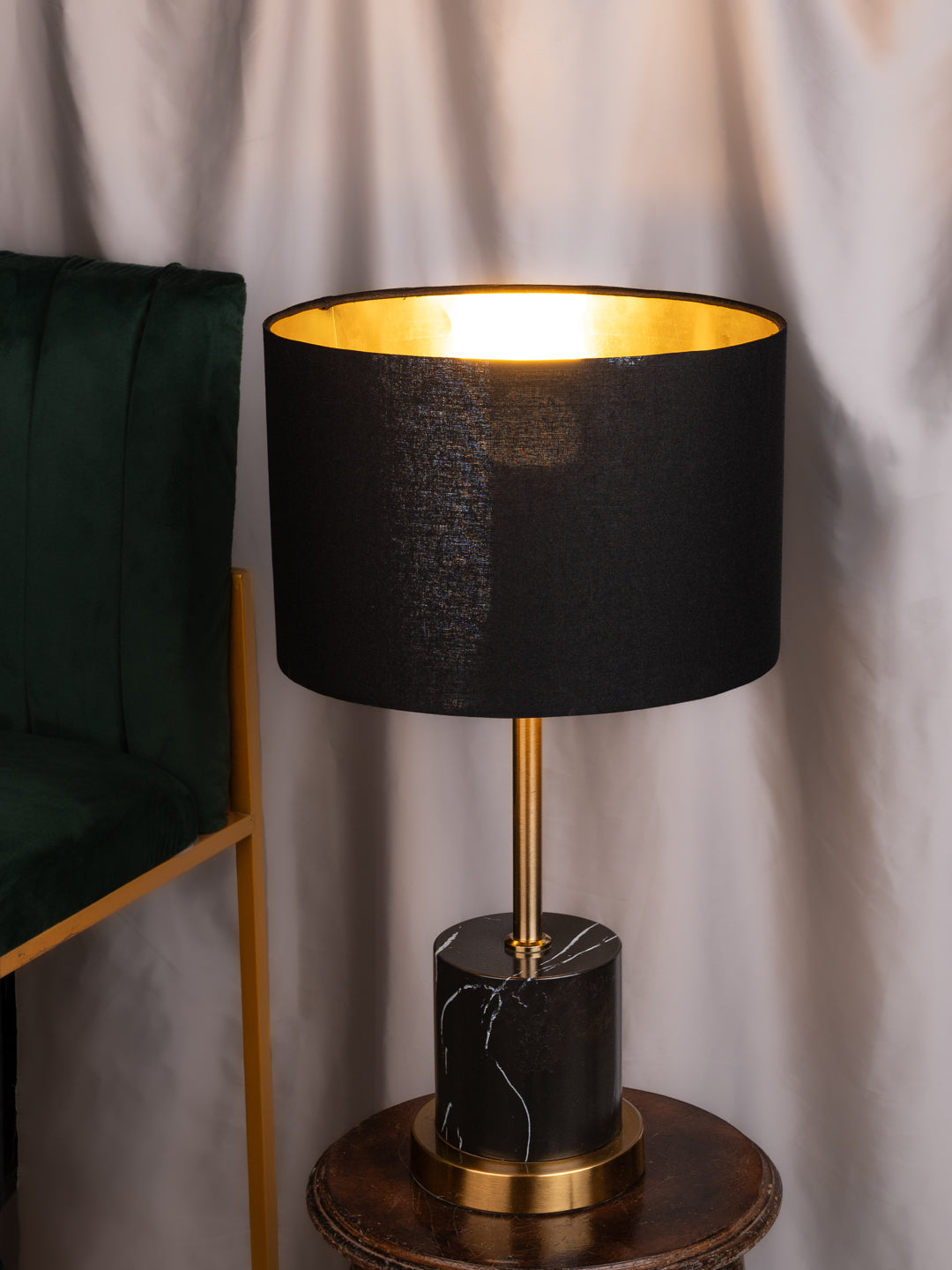 Sleek black table lamp / bedside lamp with an attractive designer base