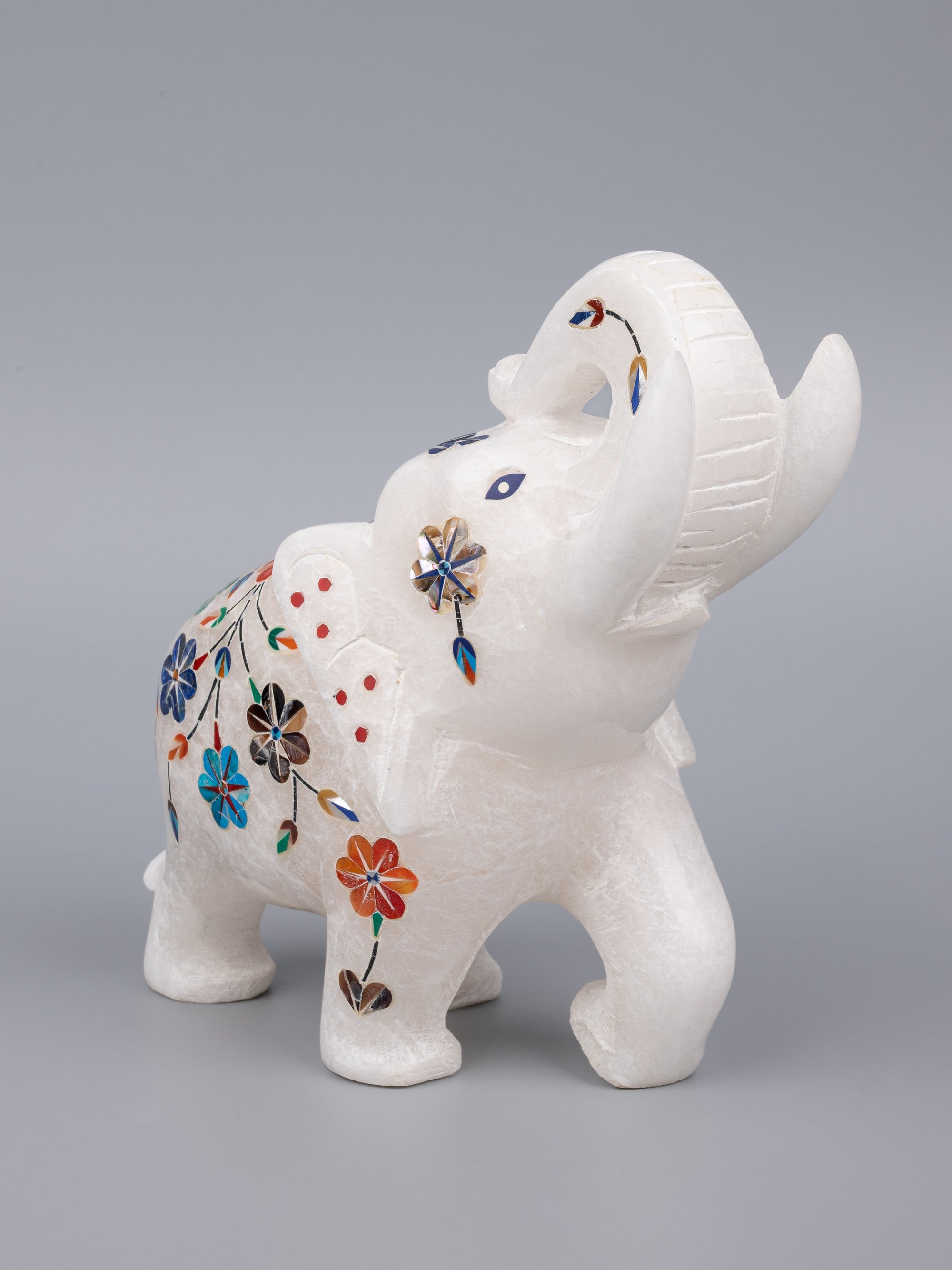 Hand carved, trunk-up marble elephant with colorful inlay work - The Heritage Artifacts