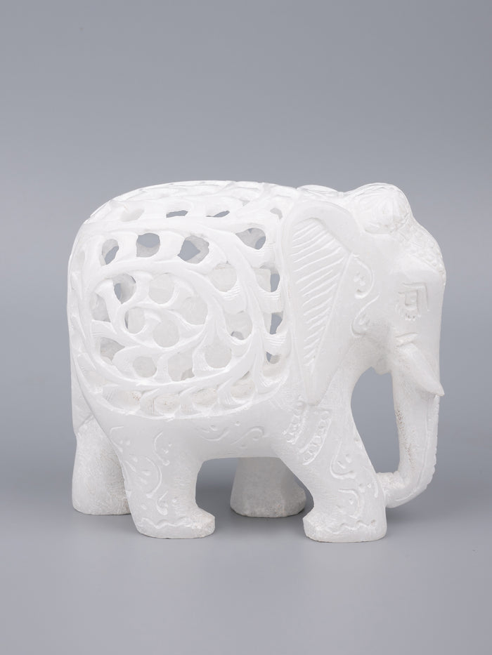 Decorative marble elephant with jali carving in pure white color - The Heritage Artifacts