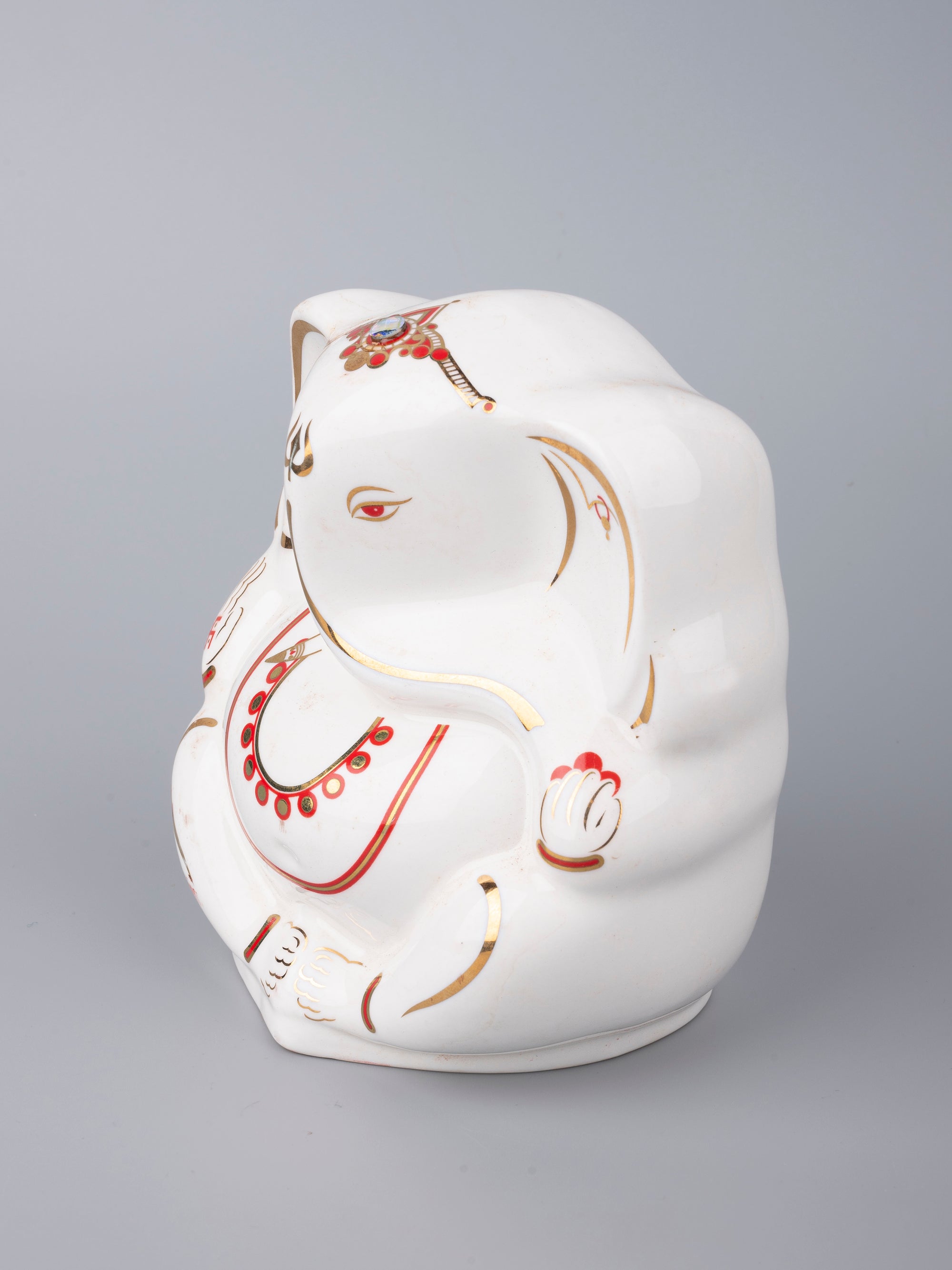 White Ceramic Ganesh Idol with Red Decorations - The Heritage Artifacts
