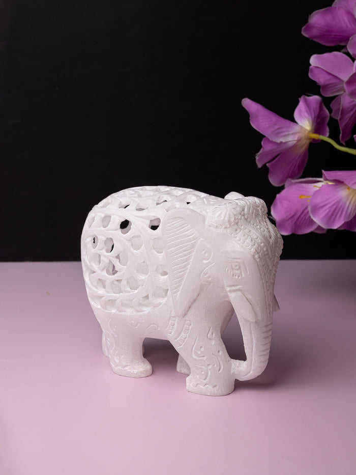 Decorative marble elephant with jali carving in pure white color - The Heritage Artifacts