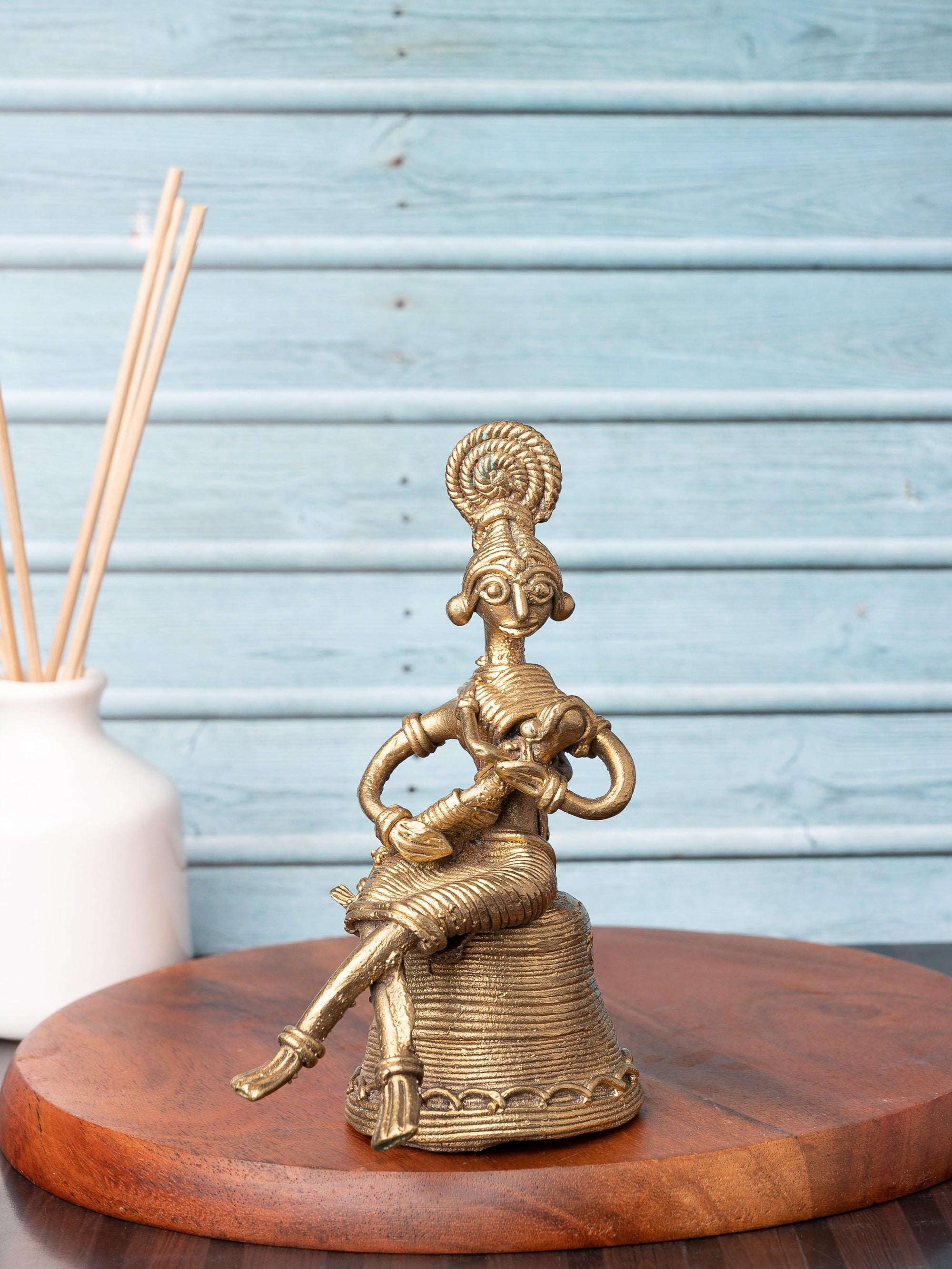 Dokra Craft Tribal Lady sitting with Child in her arms - The Heritage Artifacts