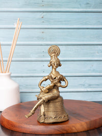 Dokra Craft Tribal Lady sitting with Child in her arms - The Heritage Artifacts
