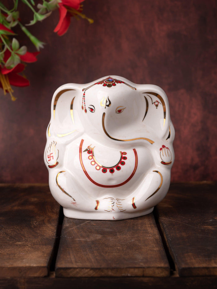 White Ceramic Ganesh Idol with Red Decorations - The Heritage Artifacts