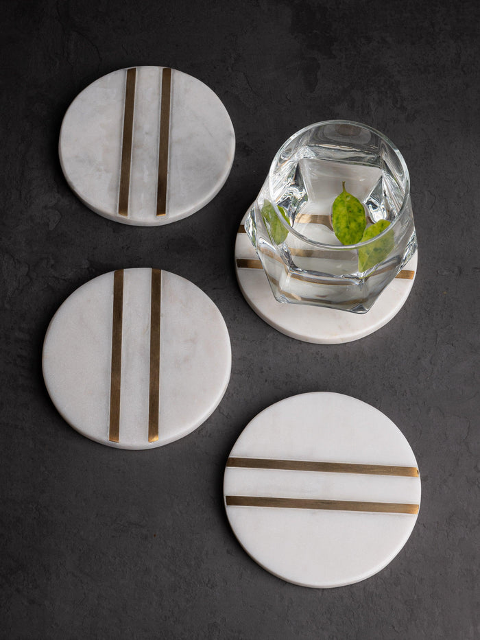 White marble 4 pieces coaster set in round shape with brass inlay work - The Heritage Artifacts