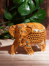 Kadam wood carved Jali Design Elephant figurine with a sad face - The Heritage Artifacts