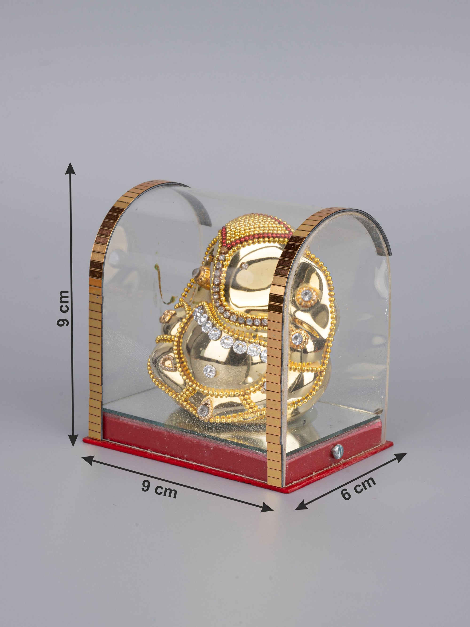 Small Sitting Ganesh Statue in Golden color inside an Acrylic Box - The Heritage Artifacts