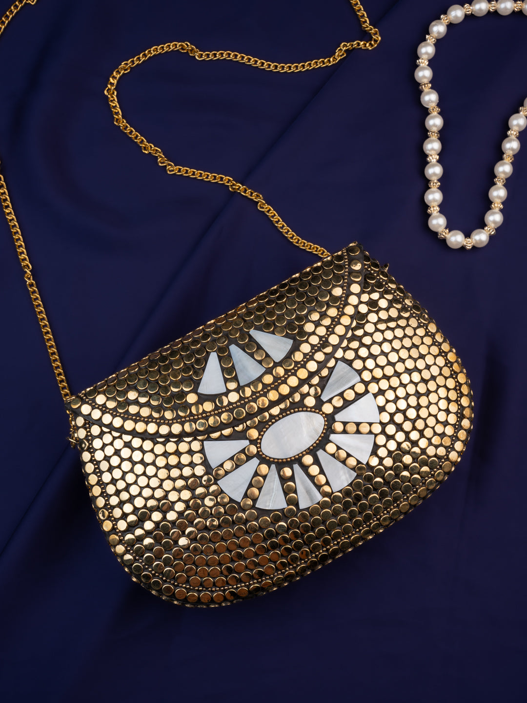 Brass crafted golden clutch for evening parties and gatherings