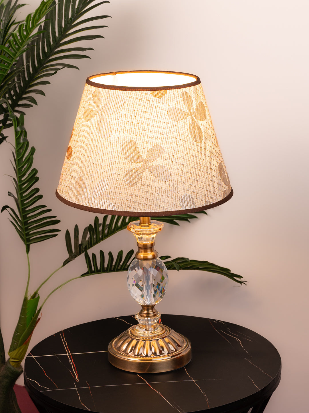 Well crafted floral shade with a gold and crystal ball base table lamp / bedside lamp