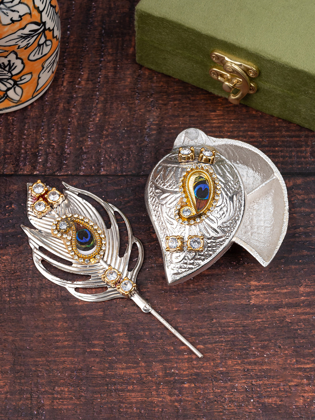 Colorful peacock design tilak tika with sindoor dibbi in a velvet box