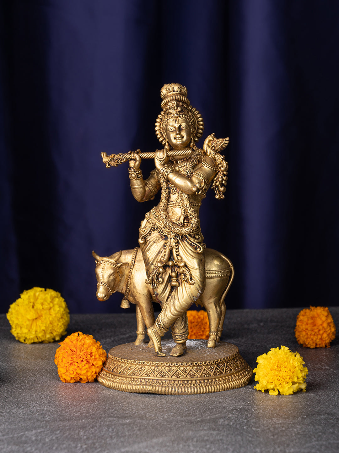 Brass crafted divine lord Krishna with cow and flute - 8 inches