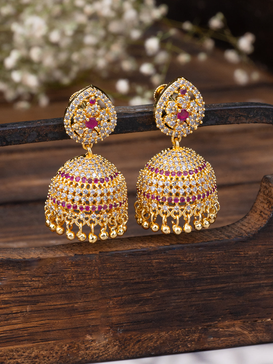 MAURYANA - Kundan mina golden jhumka earrings with red stone decoration