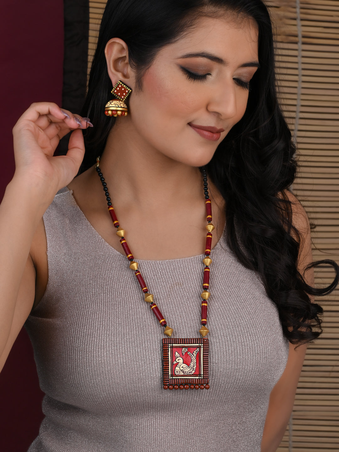 MAURYANA - Terracotta red and gold peacock design pendant necklace set with earrings - adjustable length