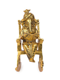 Antique Gold finish Idol of Lord Ganesh reading book on a easy chair - The Heritage Artifacts