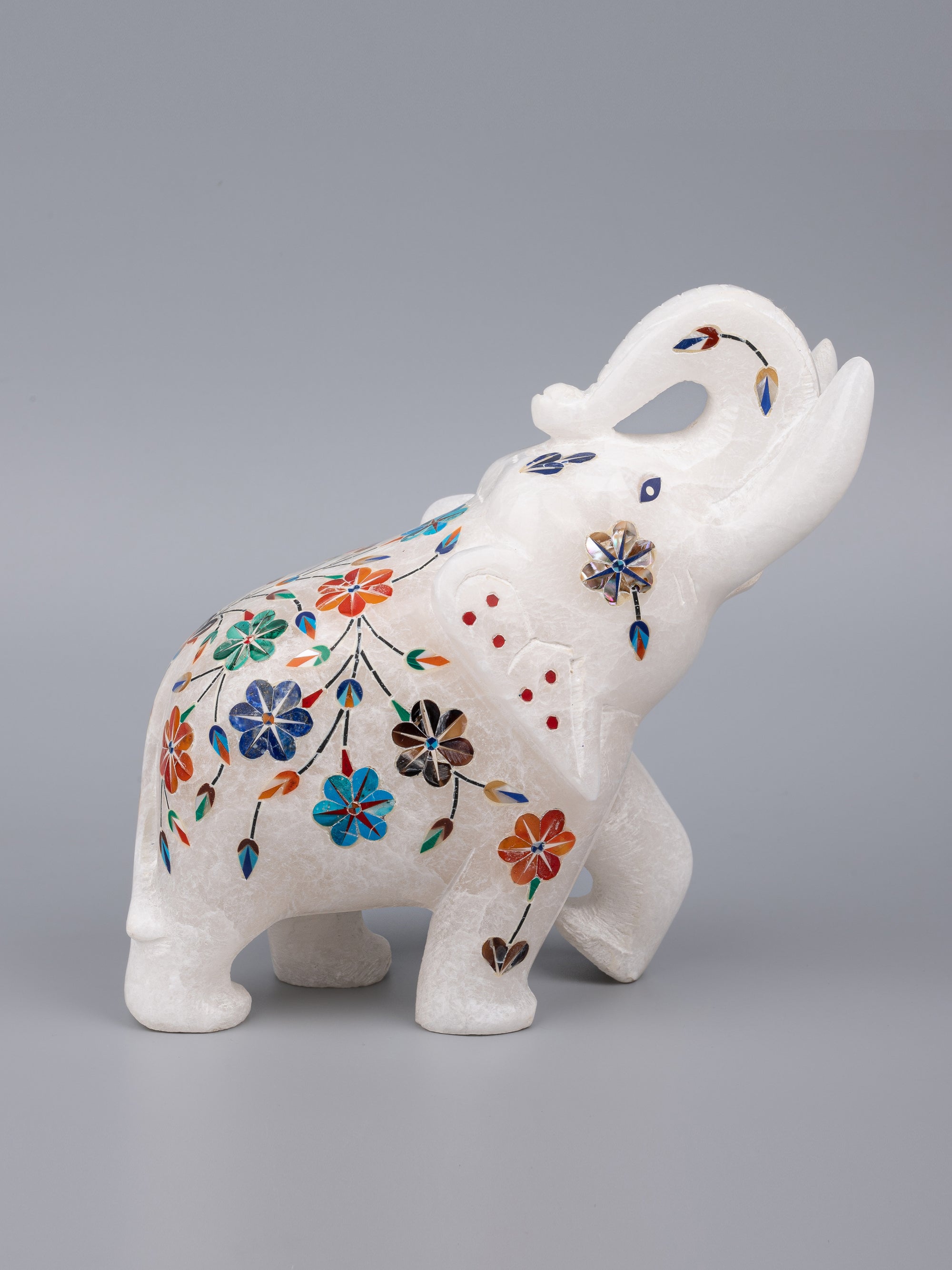 Hand carved, trunk-up marble elephant with colorful inlay work - The Heritage Artifacts