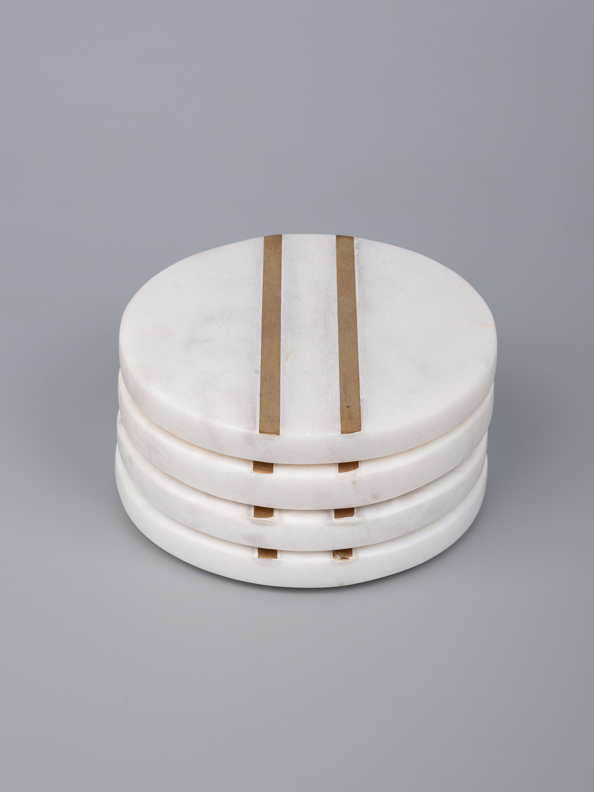 White marble 4 pieces coaster set in round shape with brass inlay work - The Heritage Artifacts