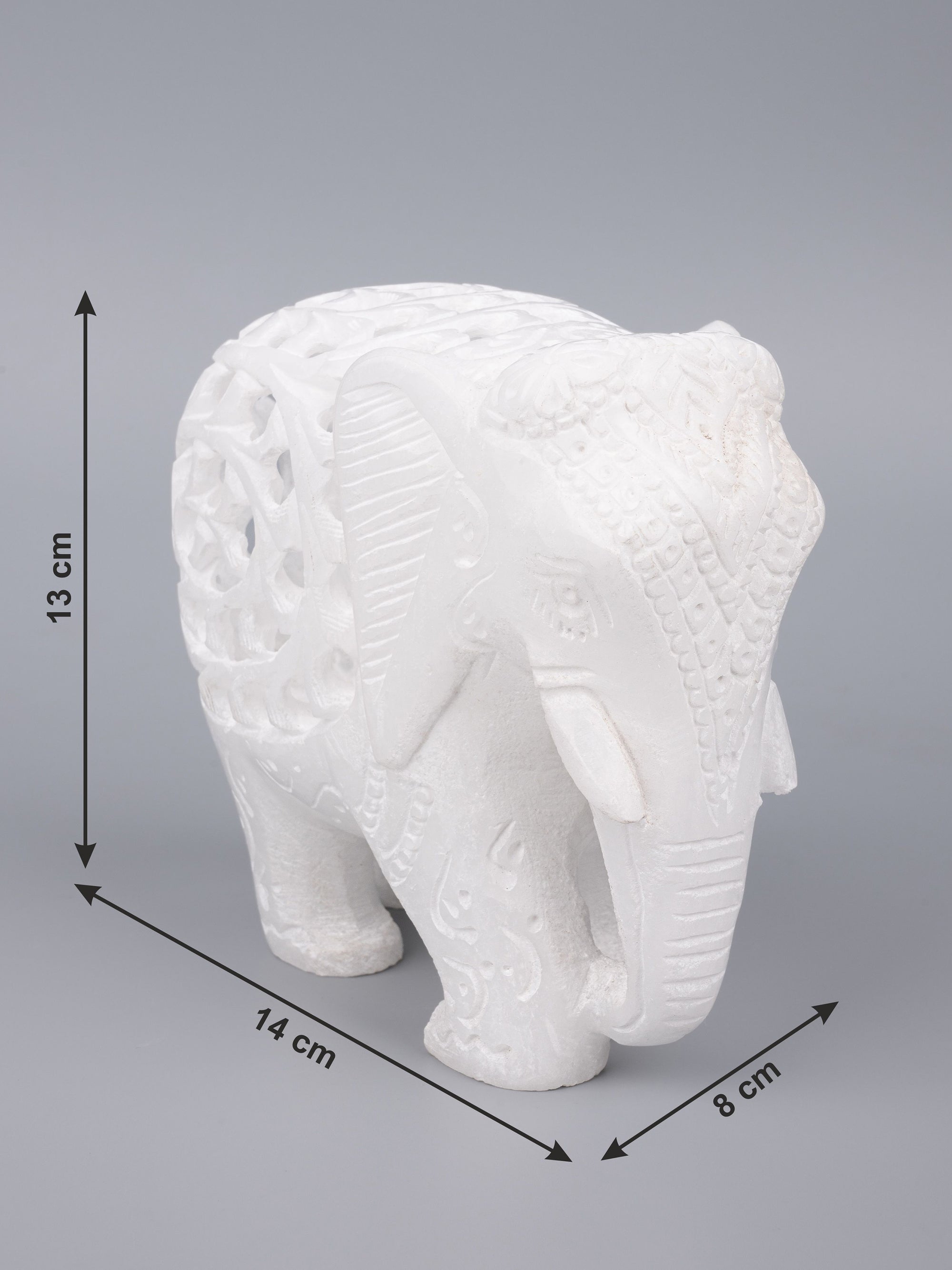 Decorative marble elephant with jali carving in pure white color - The Heritage Artifacts