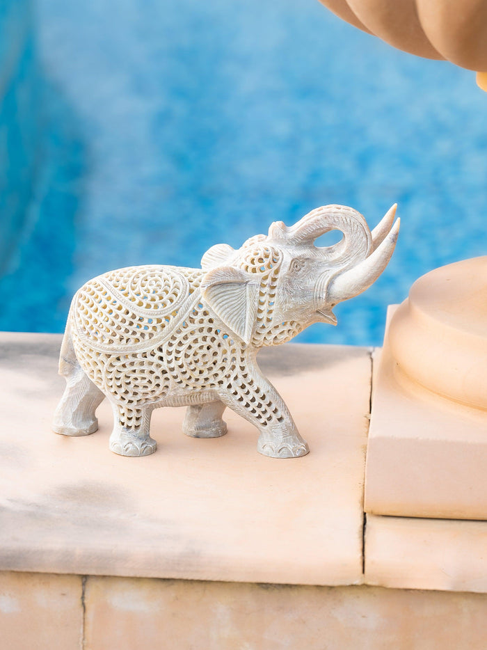 Mighty Elephant hand crafted in stone with Jali design - The Heritage Artifacts