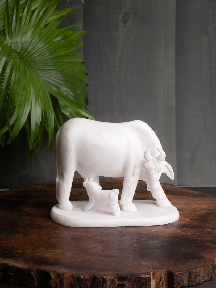 White marble Kamdhenu Cow with calf statue - The Heritage Artifacts